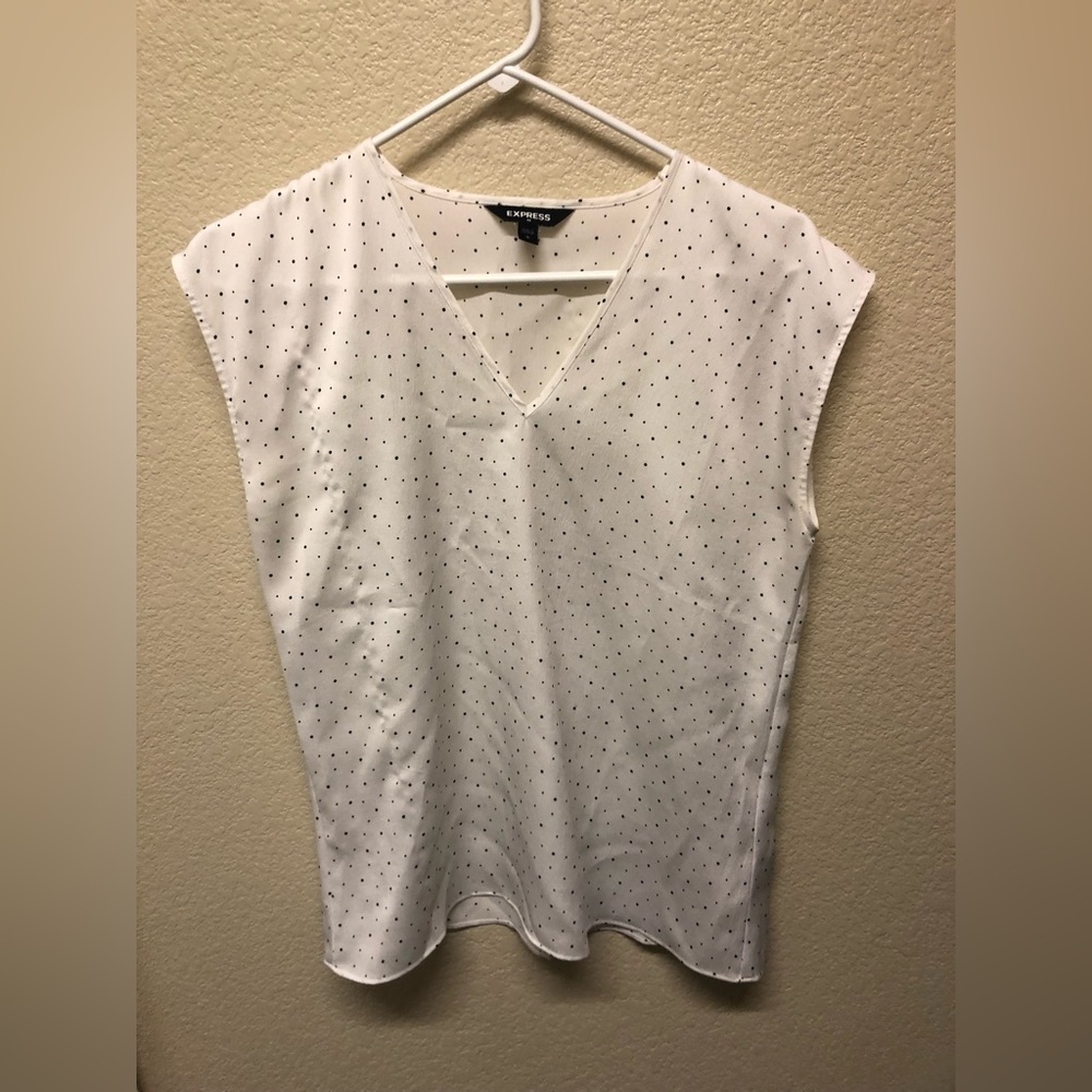 White and black polka-dot blouse